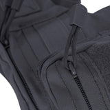 Business traveler sliding slim-profile sling pack into airport security bin, quick-access passport sleeve facing upward for inspection