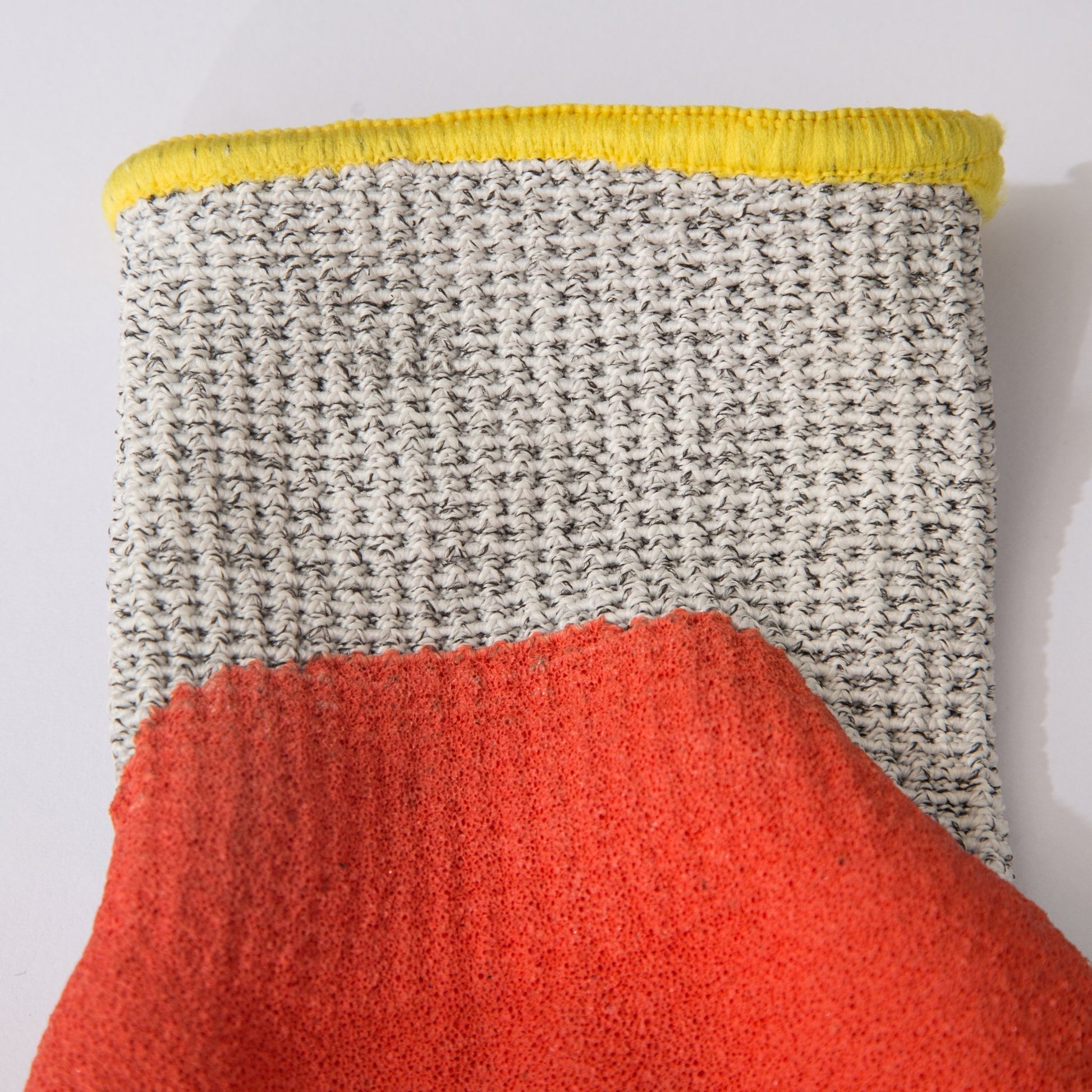 Heavy duty impact and cut resistant gloves designed for demanding work environments