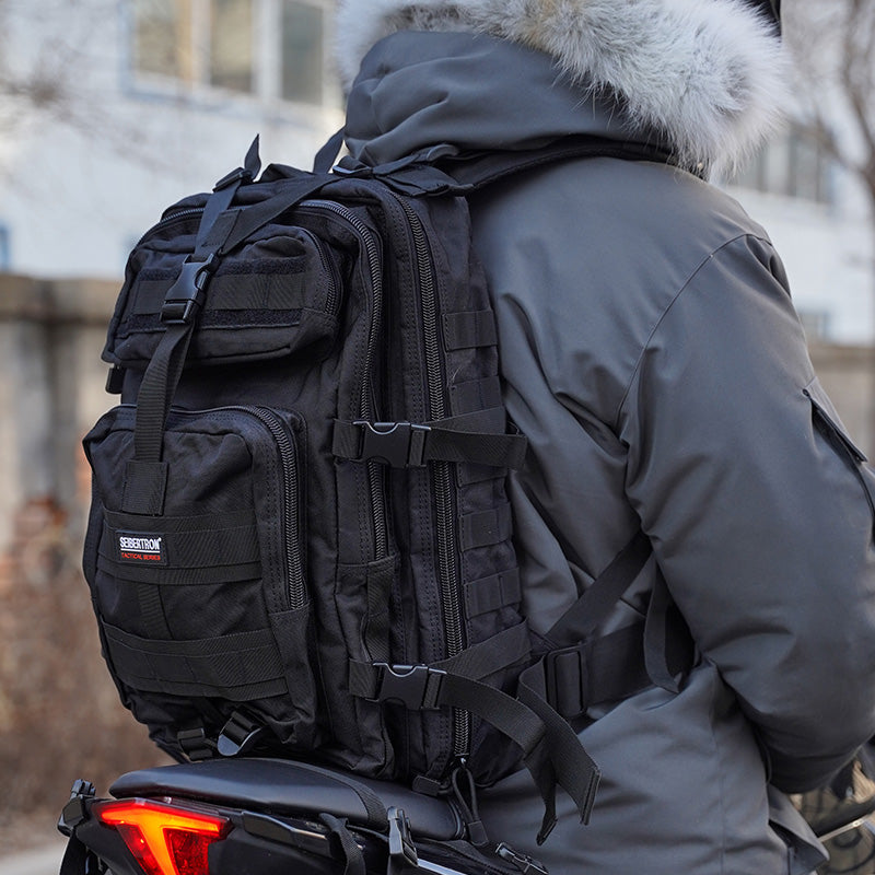 seibertron-gallery:falcon-backpack-20260715 | product:falcon-backpack | color:Black | slot:3 | Seibertron Falcon backpack black 37L backpack rear wearing scene
