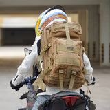 seibertron-gallery:falcon-backpack-20260715 | product:falcon-backpack | color:Khaki | slot:5 | Seibertron Falcon backpack khaki 37L backpack rear riding scene