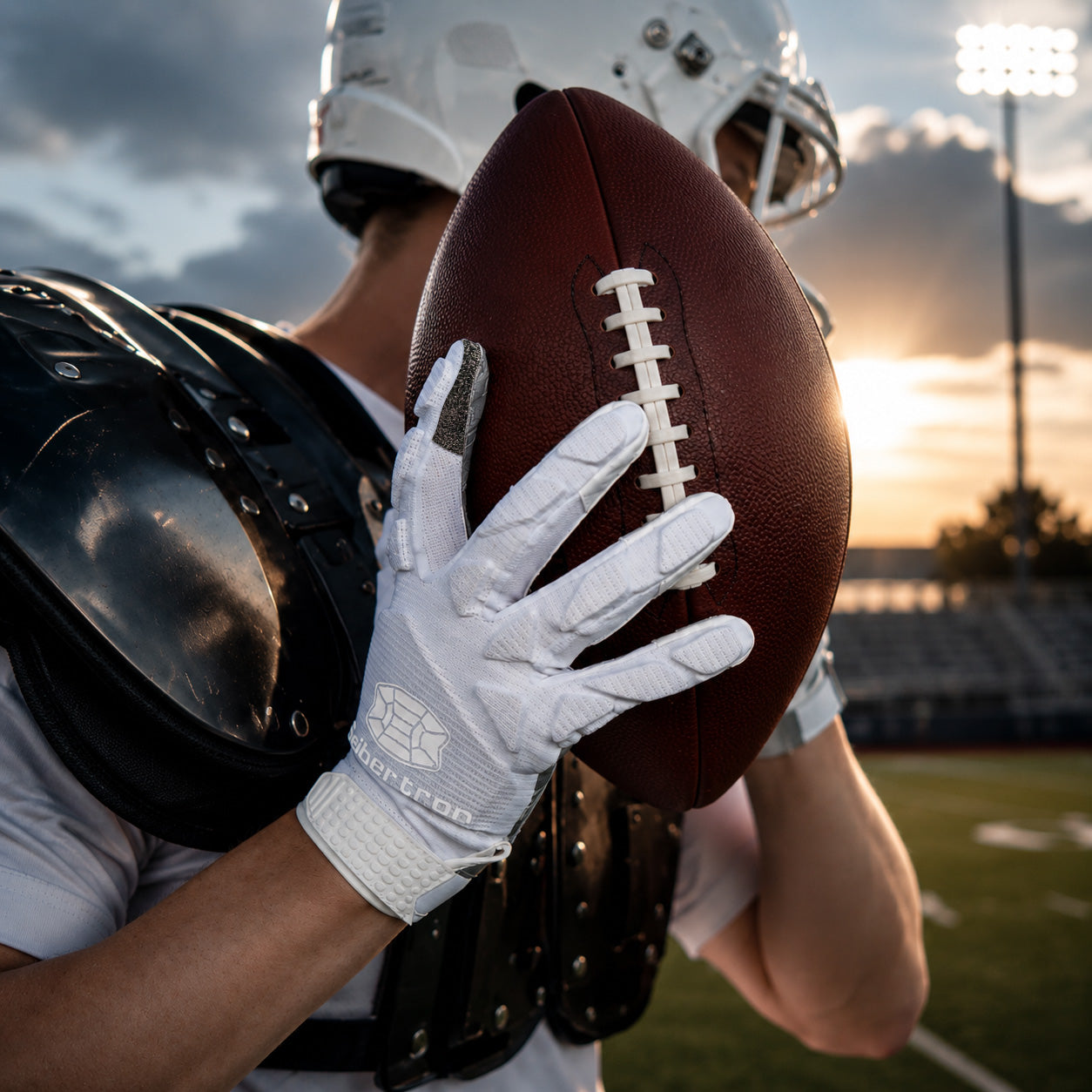 seibertron-gallery:hpirg-hp-series-20260714 | product:8307911884990 | color:White | slot:10 | Seibertron H.P.I.R.G touchscreen football receiver gloves white football closeup image