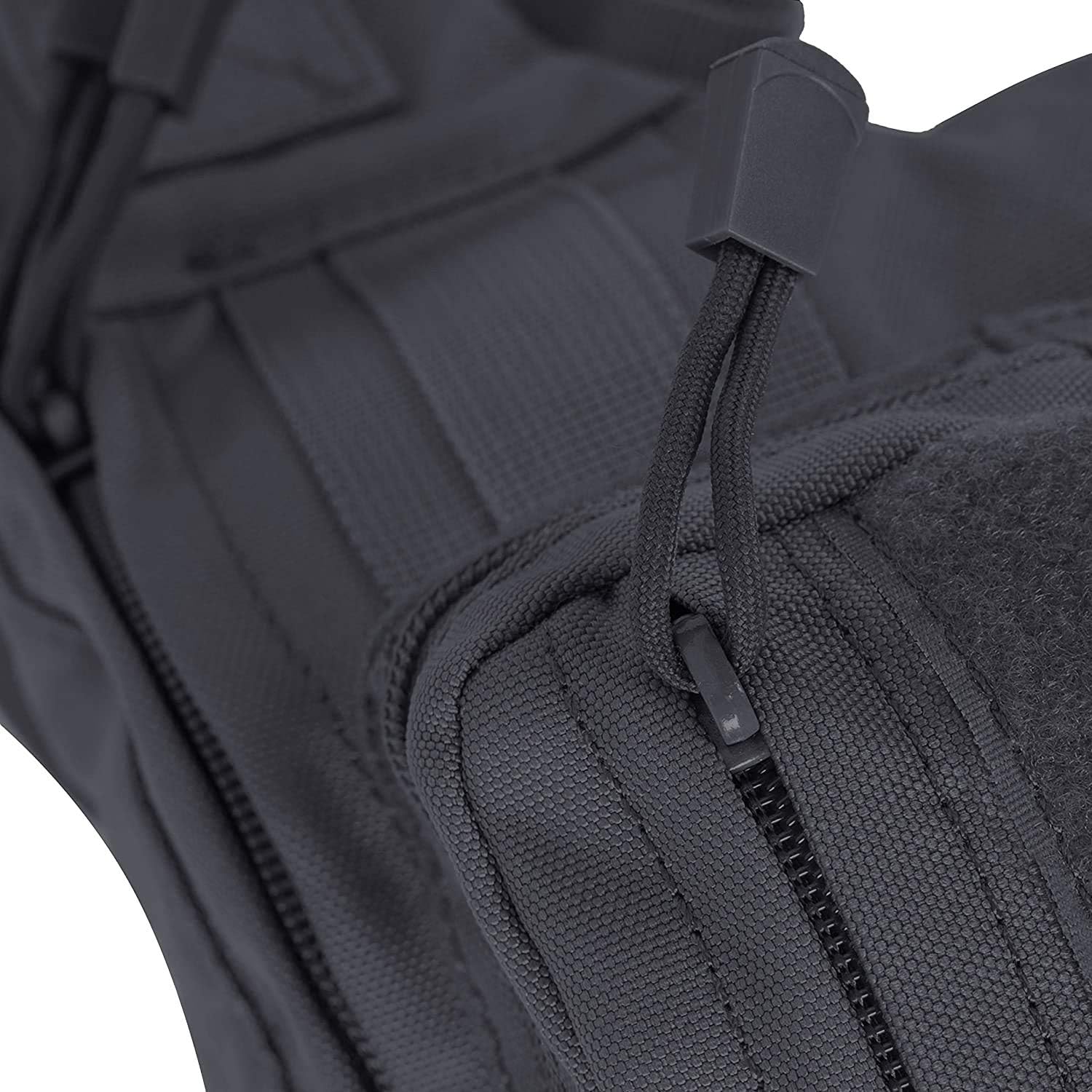 Business traveler sliding slim-profile sling pack into airport security bin, quick-access passport sleeve facing upward for inspection